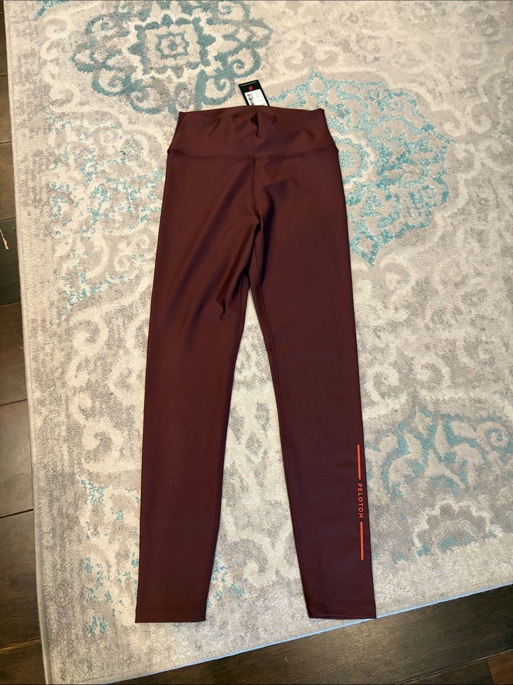 Peloton chocolate/  Maroon Leggings with orange Script
